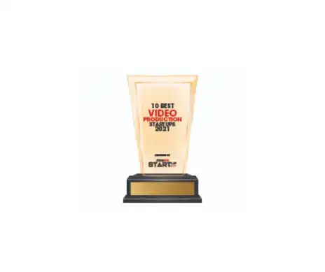 Trophy with text stating '10 Best Video Production Startups 2021' on a golden plaque with a black base.